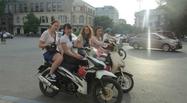 driving motorbike in Hanoi