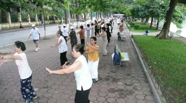 Exercising at Hoan Kiem lake in Hanoi