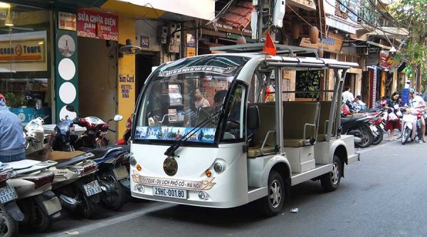 Green cart or car in Hanoi city tour
