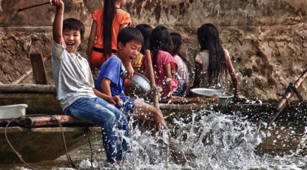 playing children at Kenh Ga in Vietnam